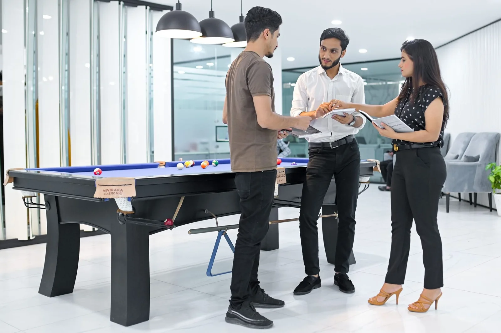 Nucleus team meeting clients in the office lounge